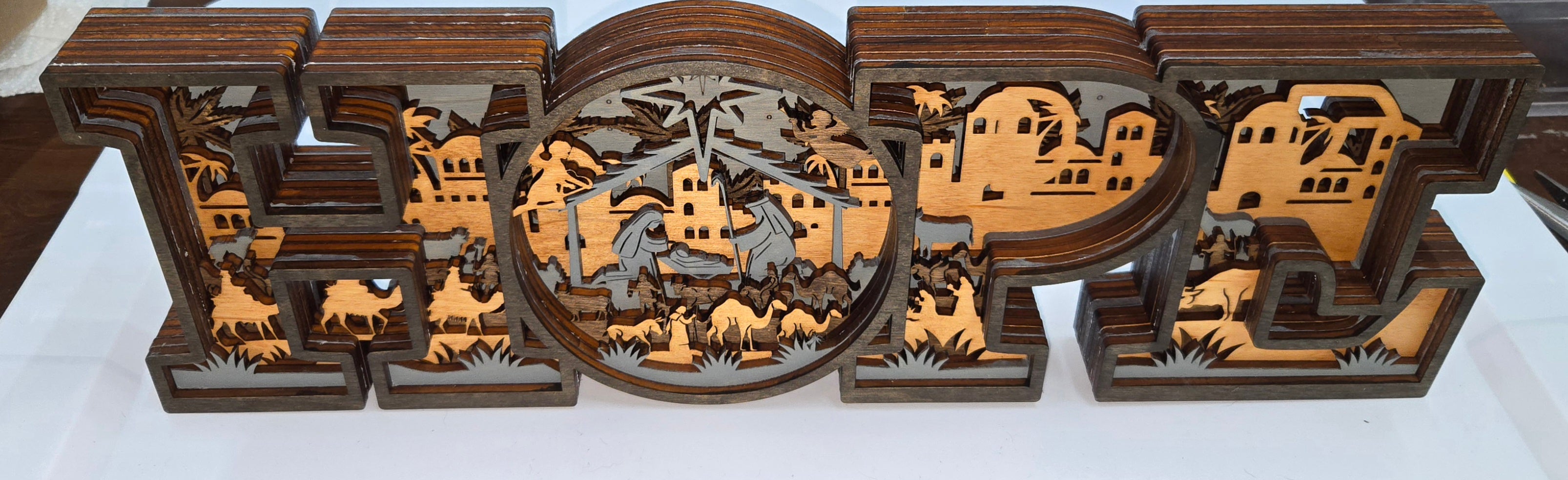Decorative wooden 'HOPE' Frame Design with Christmas nativity scene with 7-Layers

L x W x H = 17in x 1.5in x 5.5in