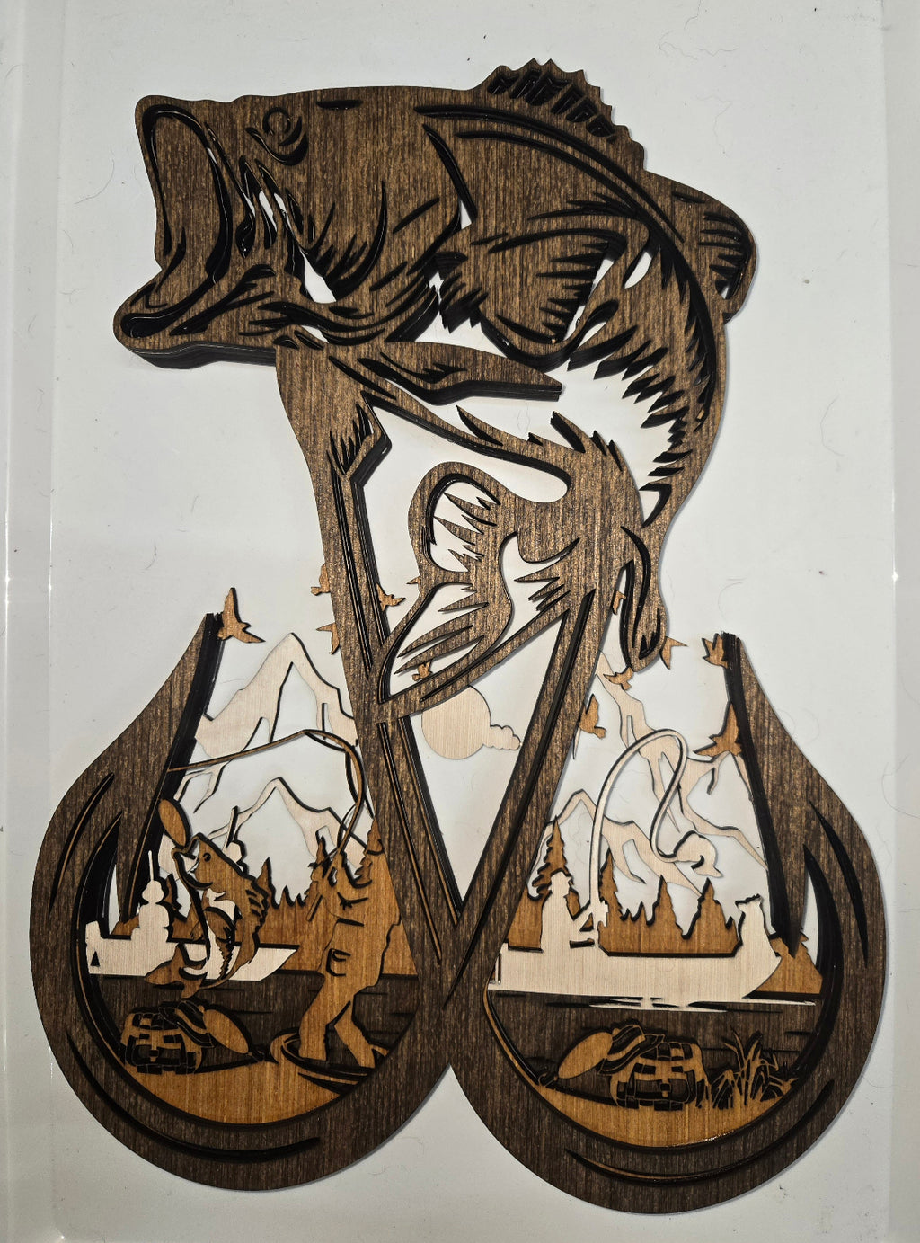 Decorative wooden Bass 2 Hook Frame Design with 6-Layers of Detail.

L x W x H = 11in x 1.25in x 15in