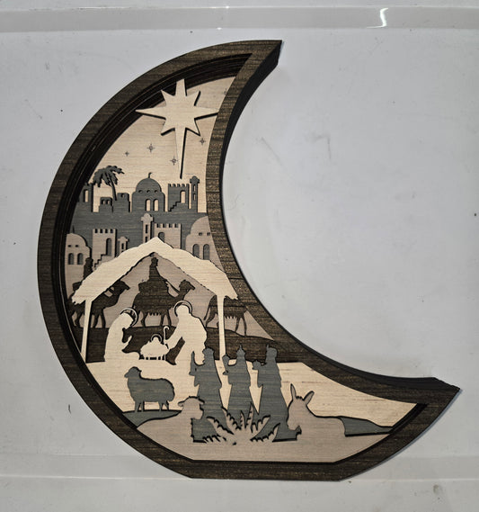 Wooden Nativity Christmas decoration 7-Layered scene cutout with a Moon Frame.

L x W x H = 10.5in x 1.5in x 11in