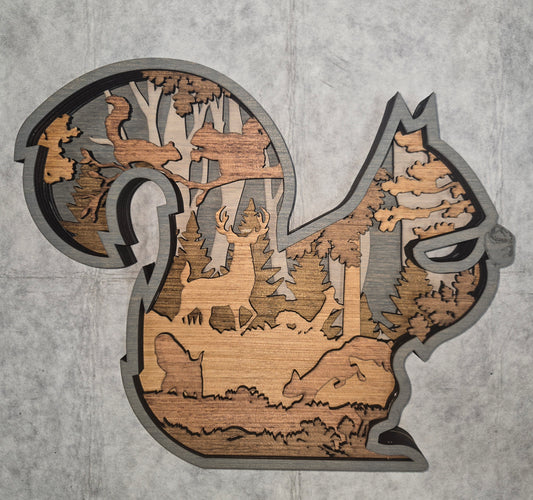 Multi-layered wall art that transcends traditional display limitations. This versatile multi-layered Squirrel functions seamlessly as a standalone accent for tables, countertops, and mantles, or mounts elegantly on walls for dramatic visual impact. Crafted with dimensional layering that creates depth and sophistication, it adapts to any interior design scheme. Whether you're seeking a focal point for a shelf, a statement piece above a fireplace, or a gallery wall installation, this art delivers professional