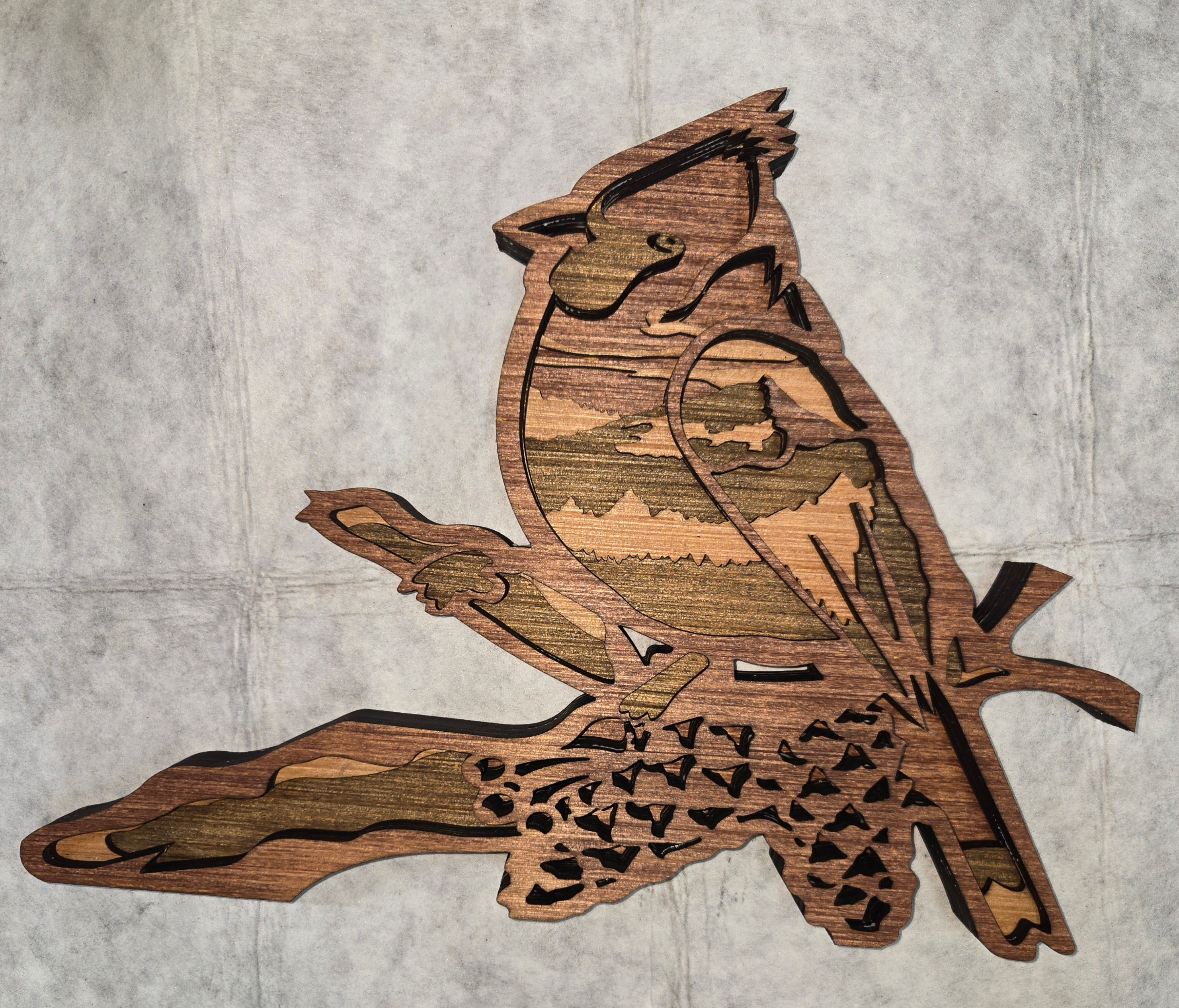 Multi-layered wall art that transcends traditional display limitations. This versatile multi-layered Red Bird functions seamlessly as a standalone accent for tables, countertops, and mantles, or mounts elegantly on walls for dramatic visual impact. Crafted with dimensional layering that creates depth and sophistication, it adapts to any interior design scheme. Whether you're seeking a focal point for a shelf, a statement piece above a fireplace, or a gallery wall installation, this art delivers professional