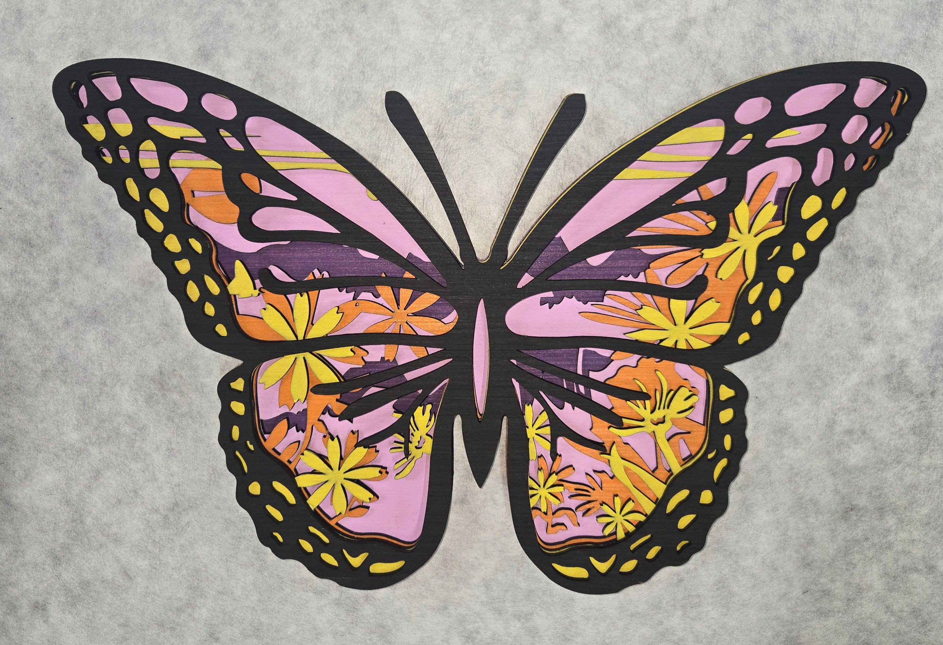 Multi-layered wall art that transcends traditional display limitations. This versatile multi-layered Butterfly functions seamlessly as a standalone accent for tables, countertops, and mantles, or mounts elegantly on walls for dramatic visual impact. Crafted with dimensional layering that creates depth and sophistication, it adapts to any interior design scheme. Whether you're seeking a focal point for a shelf, a statement piece above a fireplace, or a gallery wall installation, this art delivers professiona